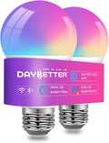 Color changing smart LED light bulbs A19 E26 glowing in a living room lamp, 6 pack