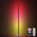 Smart RGB LED corner floor lamp glowing purple beside a desk in a gaming room