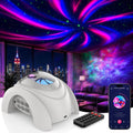 Dual lens star projector aurora night light glowing over a bed with blue and pink light
