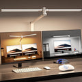 Clamp-on LED desk lamp with gooseneck arm lighting a keyboard in a home office