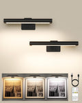 Rechargeable picture light mounted above a framed painting casting warm gallery light