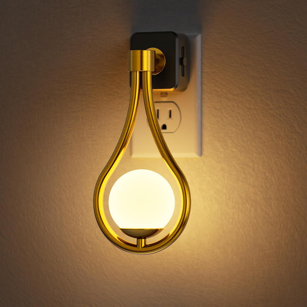 Plug in projector night light casting a soft white glow across a dark bedroom wall