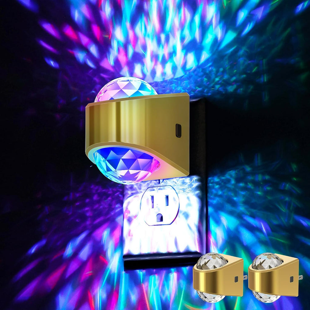 Plug in projector night light casting a soft white glow across a dark bedroom wall