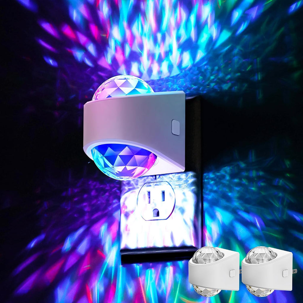 Plug in projector night light casting a soft white glow across a dark bedroom wall