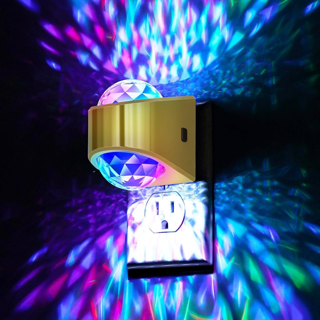 Plug in projector night light casting a soft white glow across a dark bedroom wall