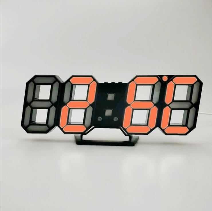3D LED wall clock displaying orange digits on a stand