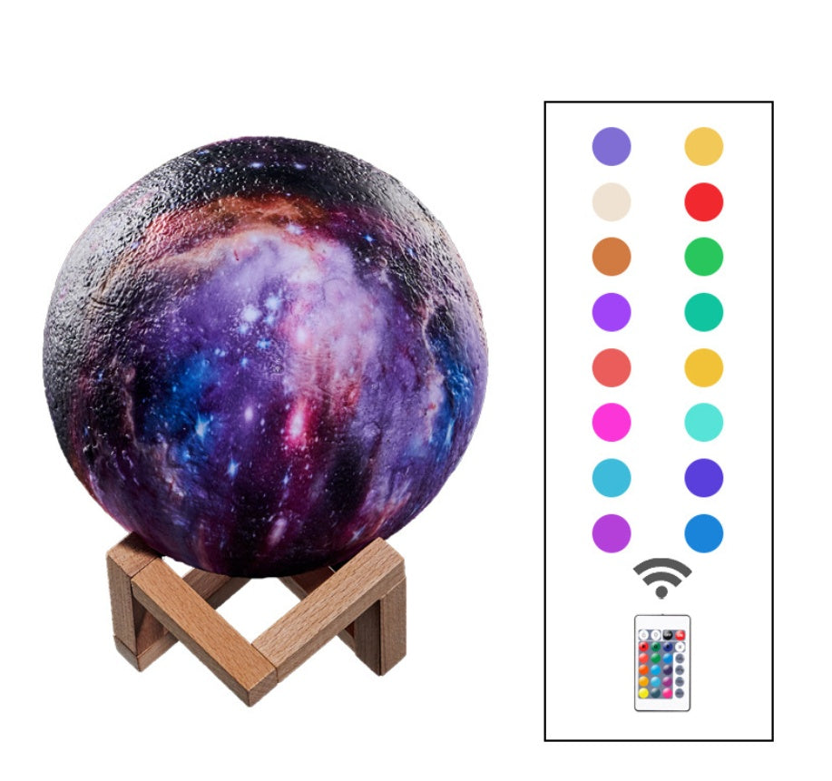 Galaxy-print moon lamp shown with its colour options and remote control