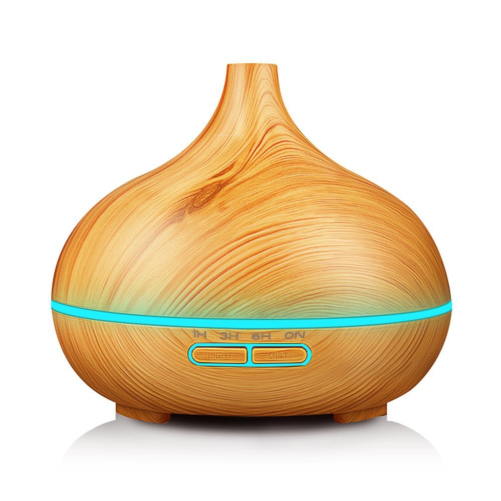 Light wood-grain aroma diffuser with a teal light ring, plain background