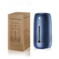 Navy blue humidifier shown next to its kraft cardboard box