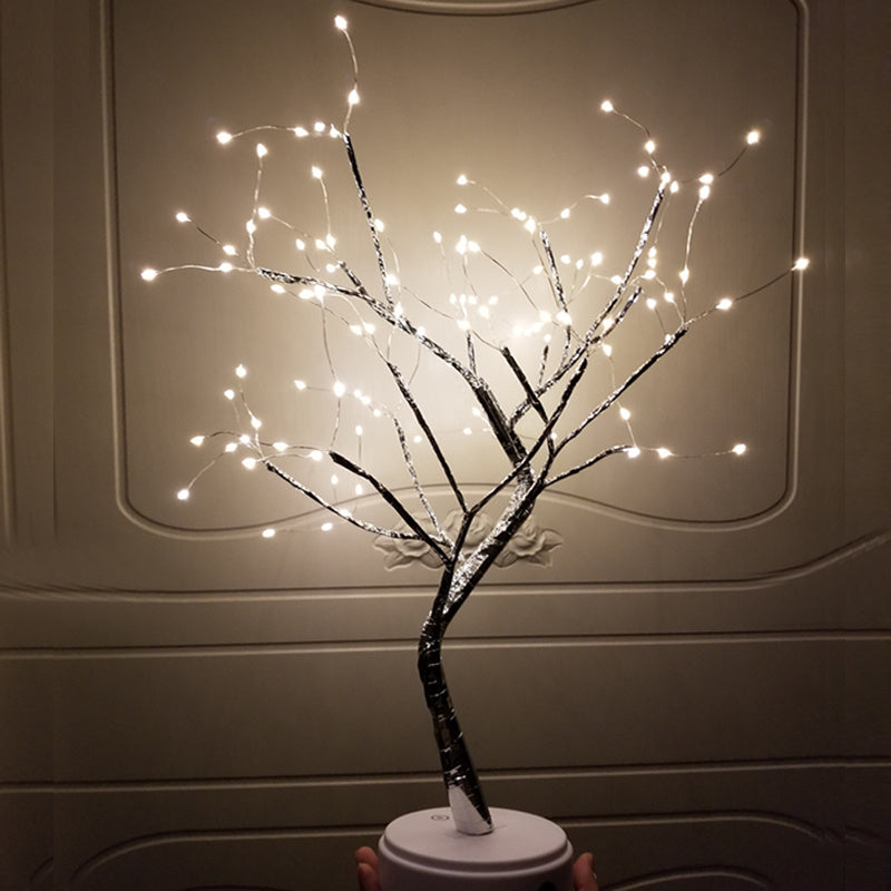 Close-up of the warm white LEDs along the wire branches of the bonsai tree light