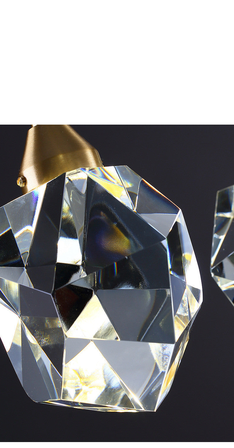 Close-up of the faceted crystal drop on the pendant