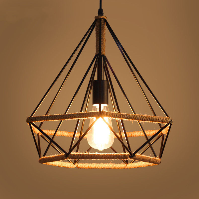 Geometric cage pendant with a filament bulb lit, plain background