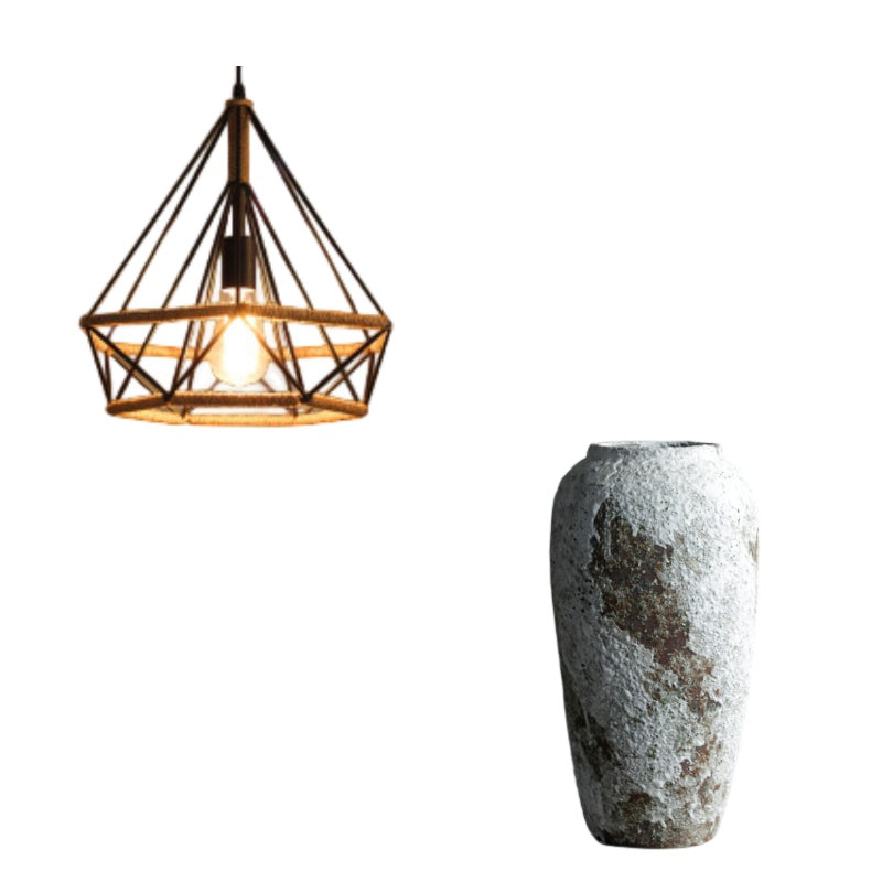 Geometric cage pendant shown beside a stone vase, the two-piece set option