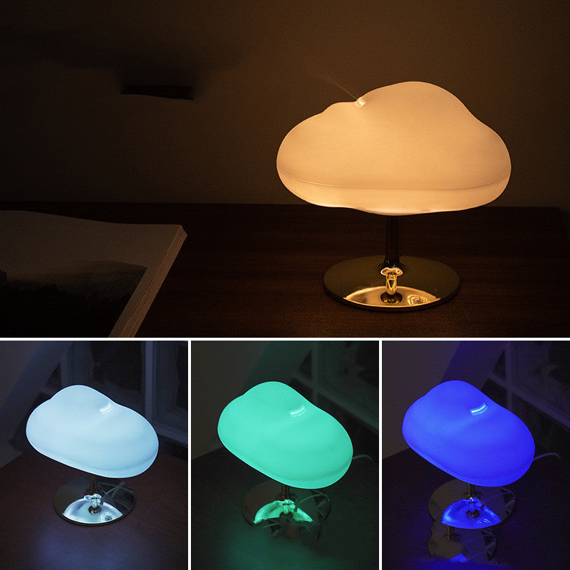 Cloud aroma diffuser shown in warm, blue, teal and purple light modes