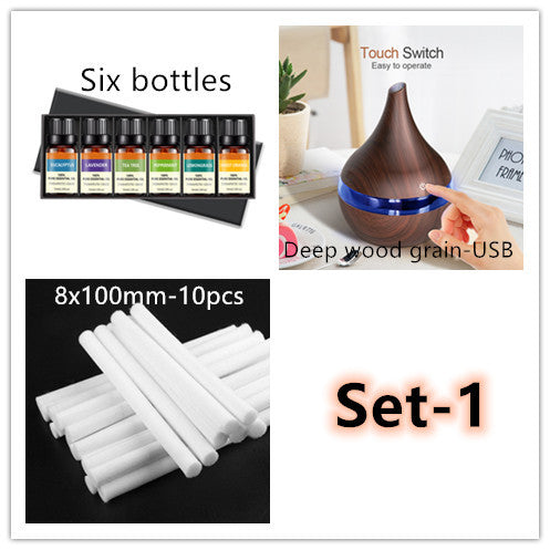 Deep wood grain diffuser shown with six oil bottles and ten replacement wicks