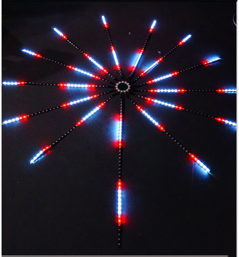 LED firework strip light lit in red and white on a dark wall