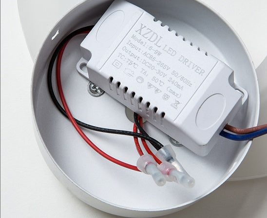 Mounting plate of the flame wall sconce with the LED driver and wiring exposed