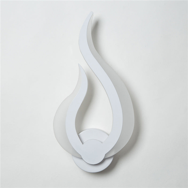 Flame-shaped wall sconce unlit, showing the full white acrylic shade