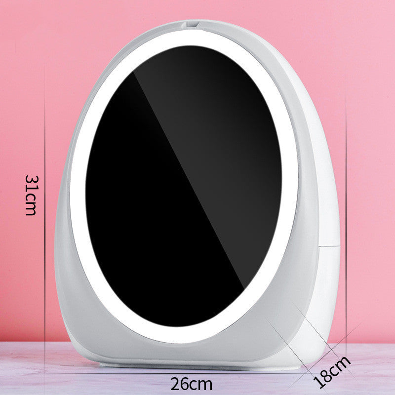 White LED mirror makeup organizer closed, marked 26 cm wide and 31 cm tall