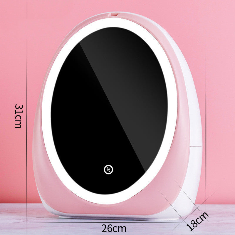 Pink LED mirror makeup organizer at an angle, showing the pull-out drawer at the base