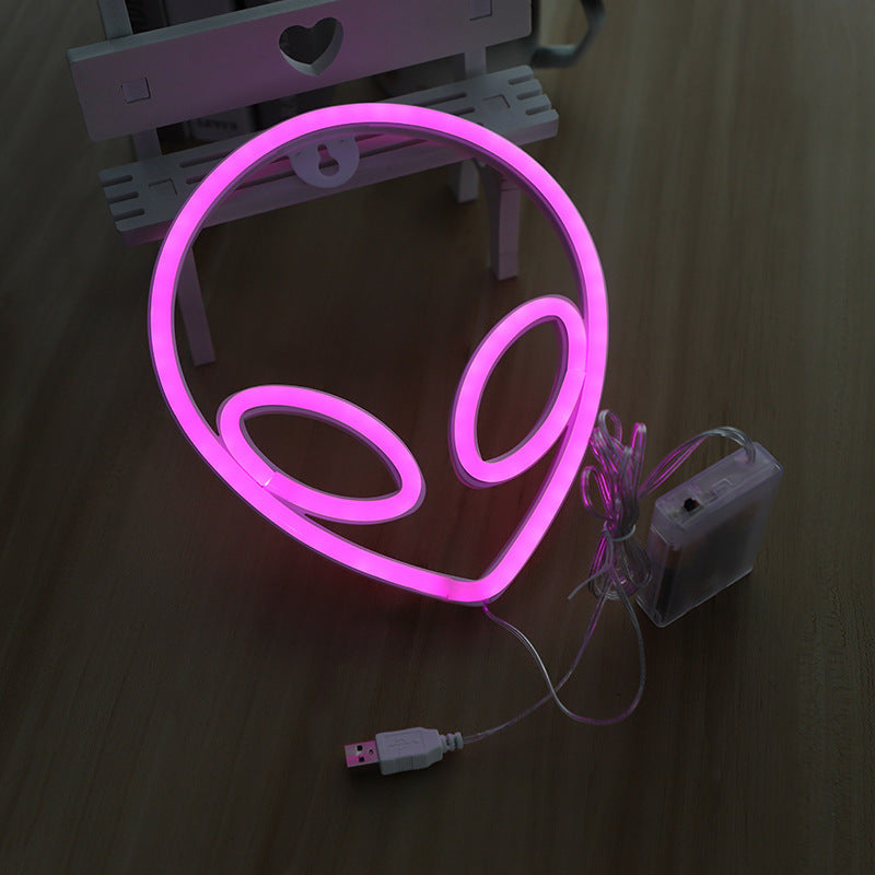 Neon wall sign in pink