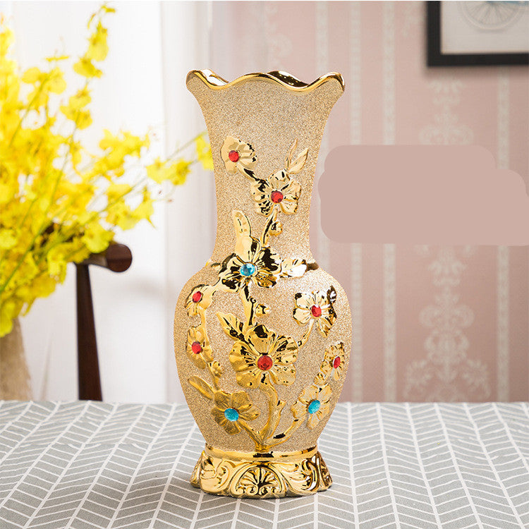 Tall cream ceramic vase with gold floral relief and coloured stones